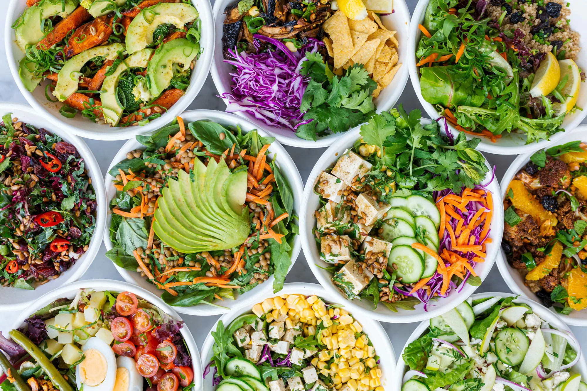 Bowls of fresh salads